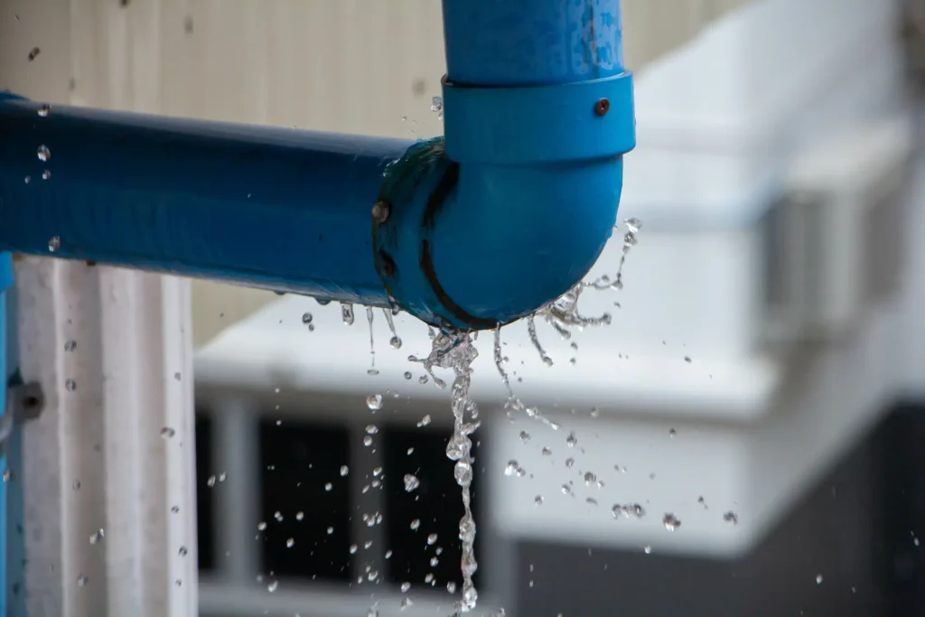 Plumber repairing household water pipes